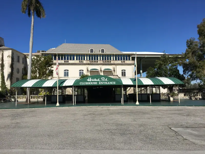 Hialeah Park's clubhouse with green-striped awnings