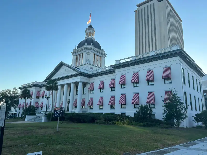 Florida's Historic Capitol, with its dome and red-and-white striped awnings